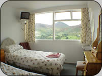 Twin bedroom with views out to Causey Pike and the Newlands Valley